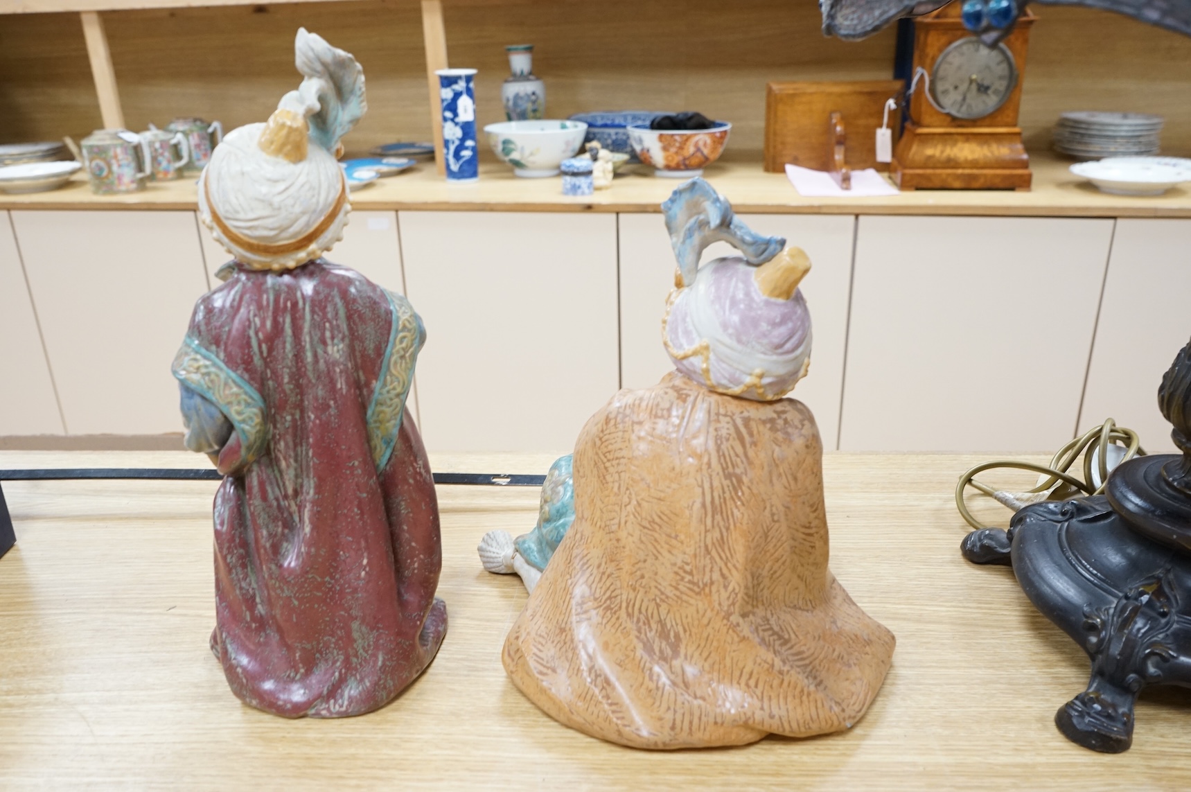 Two Lladro polychrome stoneware figures of ‘Sultans’.(2) tallest 40cm.